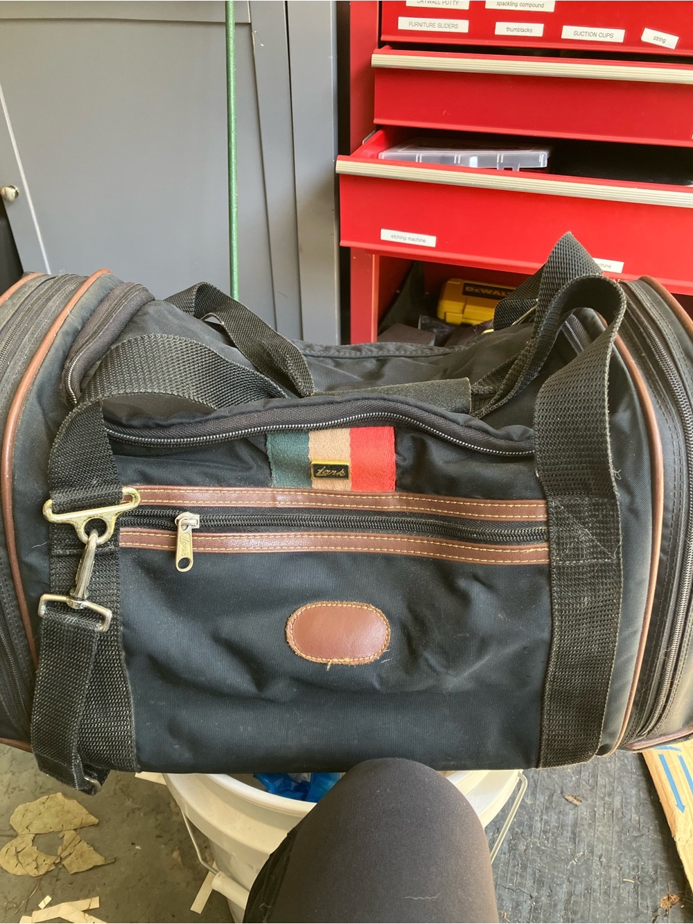 Vtg Lark Black Duffel Nylon Bag with Brown Trim and Red-Green Accent -